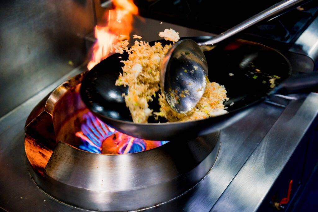 Fried rice cooked in a flaming wok