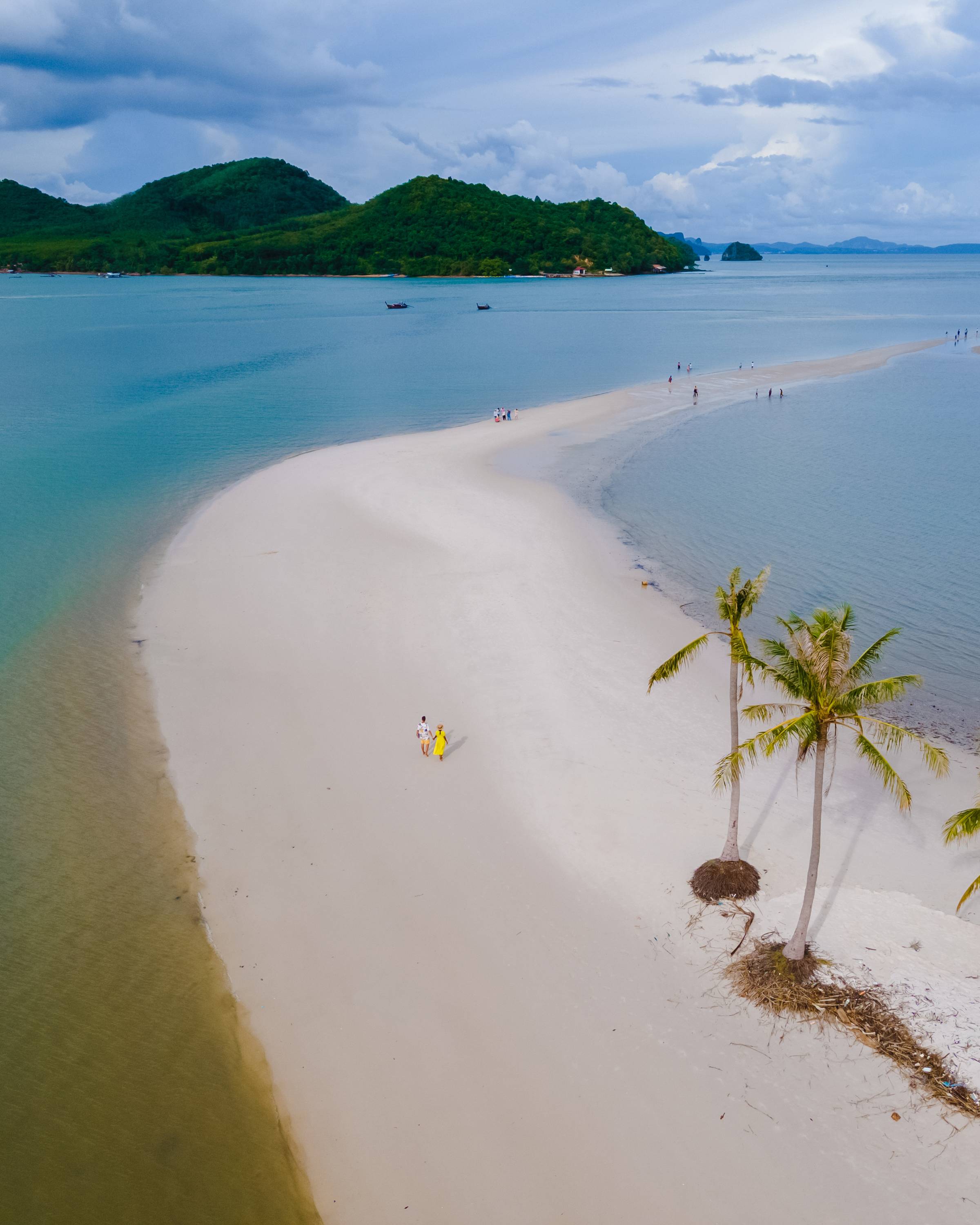 people on LAEM Haad beach with white sand and palm trees, koh Yao Yai, Thailand