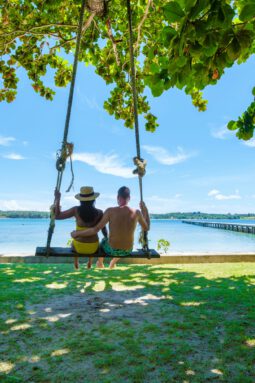 Man and women on a tropical beach in Thailand, Koh Kham Thailand Trat