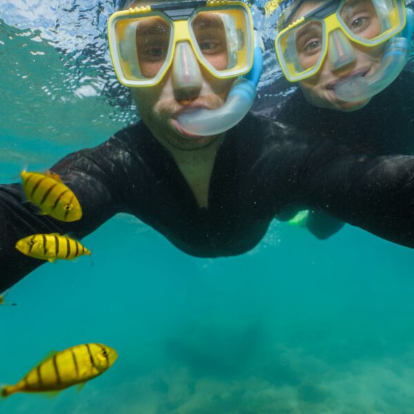 young couple doing snorkeling